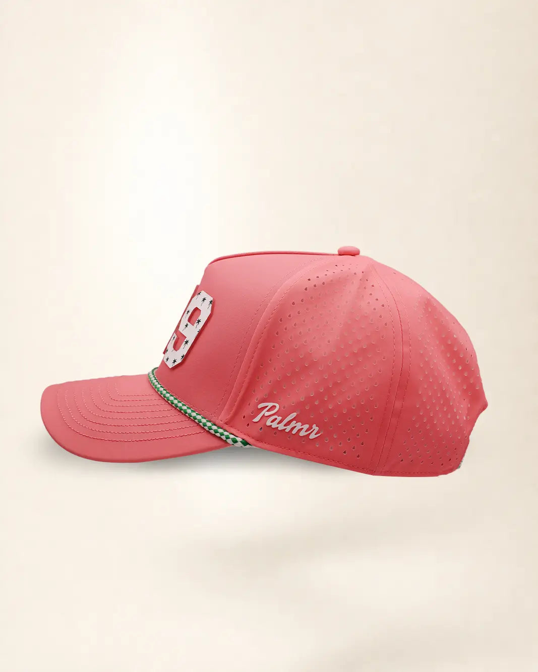 A pink perforated baseball cap showcasing the '239' State with a green and white patterned trim along the brim and white 'Palmr' script embroidery on the side, shown against a light beige background.