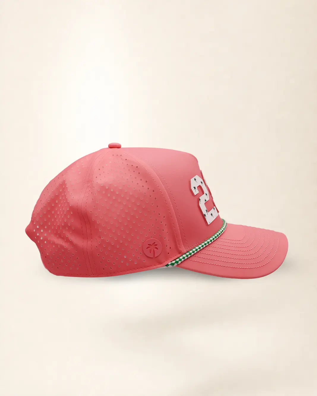 A pink perforated baseball cap showcasing the '239' State with a green and white patterned trim along the brim and white 'Palmr' script embroidery on the side, shown against a light beige background.