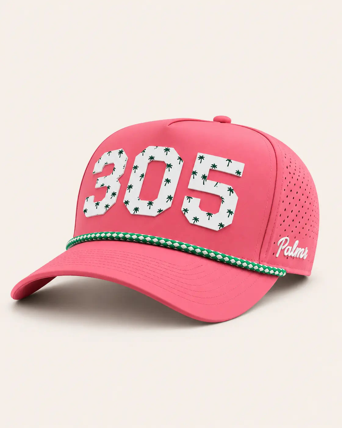 Pink cap with '305' and palm tree design on a beige background