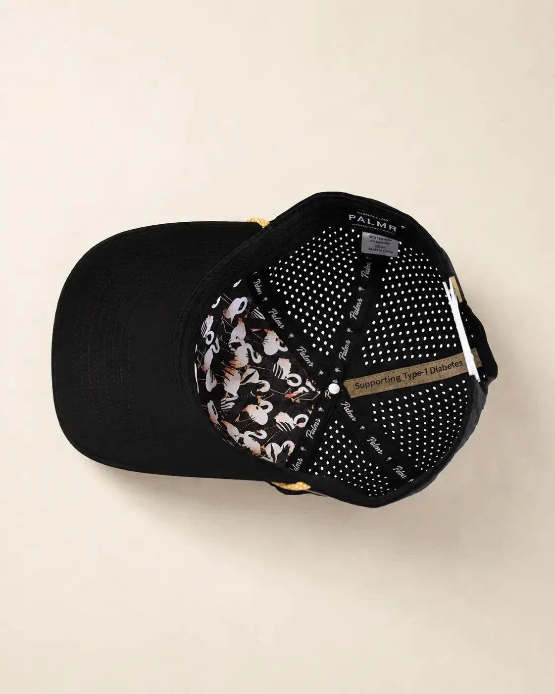 The 407 Signature Hat black and gold with Orlando area code and gold rope detailing