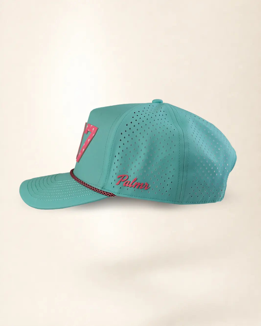 A teal perforated baseball cap with a curved brim, featuring a pink and white shield logo on the side and red cursive embroidery reading 'Palmers' on the front panel.