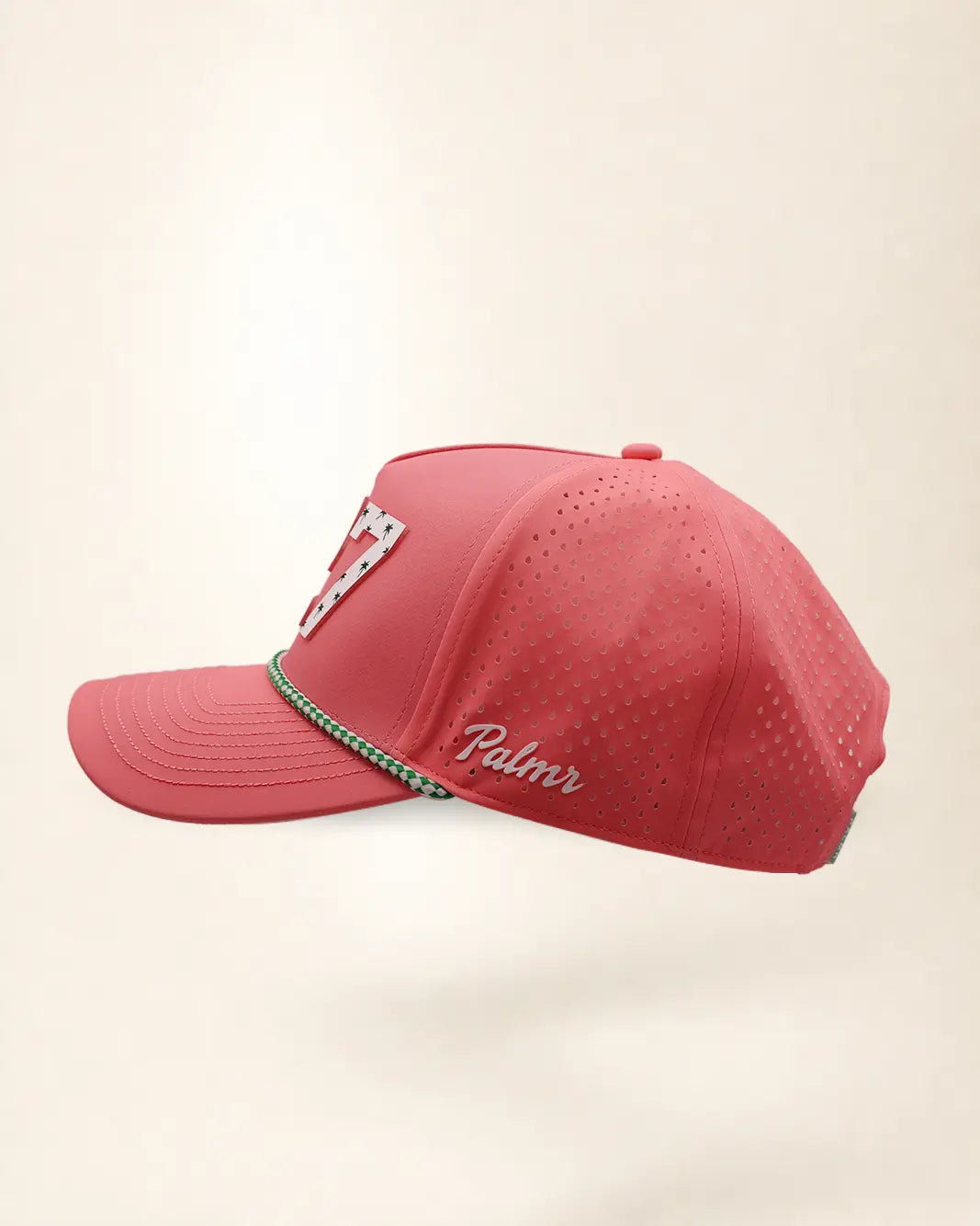 The 727 Signature Hat (Pink), left side view: white Palmr script, perforated side panel, green and white rope, edge of the white 727.