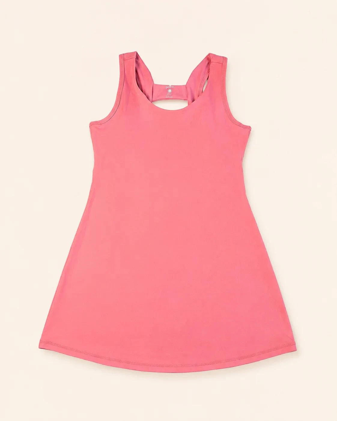 Pink Ace Dress with pockets and removable bra cups designed for active lifestyle and comfort