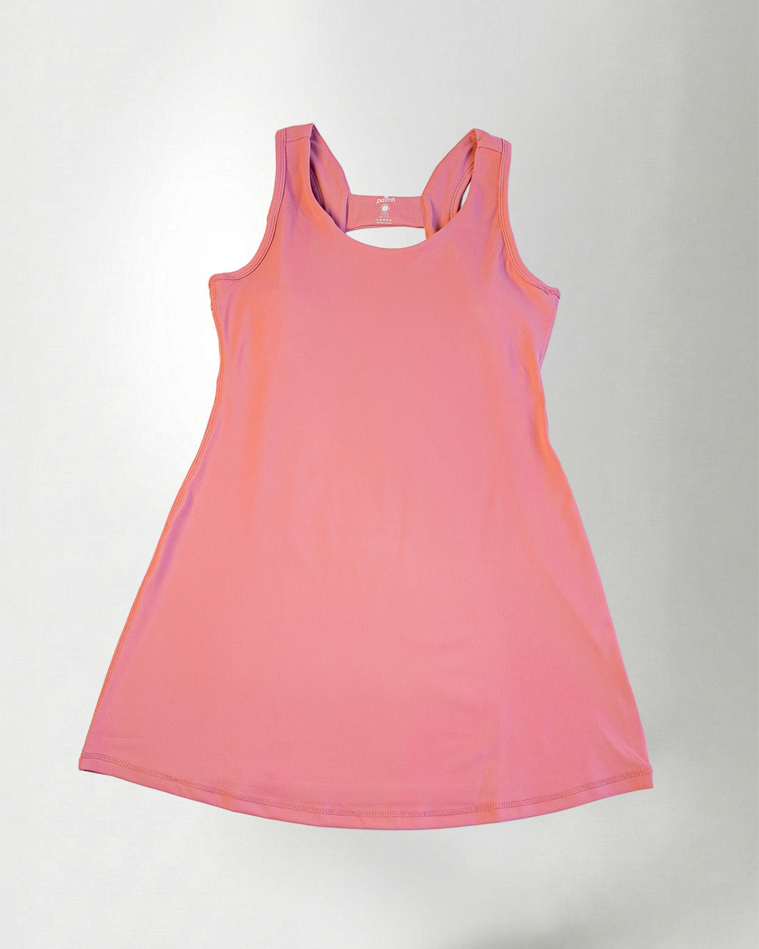 Pink dress against white background