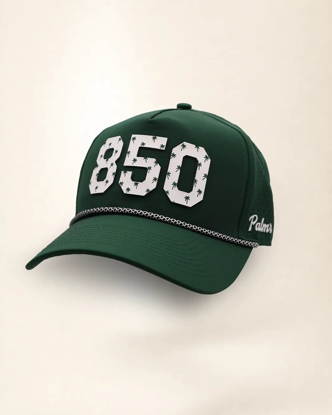 The 850 Signature Hat (Green): dark green rope snapback, white 850 with small green palm trees, black and white braided rope, perforated sides.