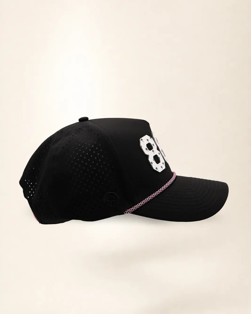 The 863 Signature Hat (Black), right side view: perforated side panel, palm badge, pink and white rope, edge of the white 863.