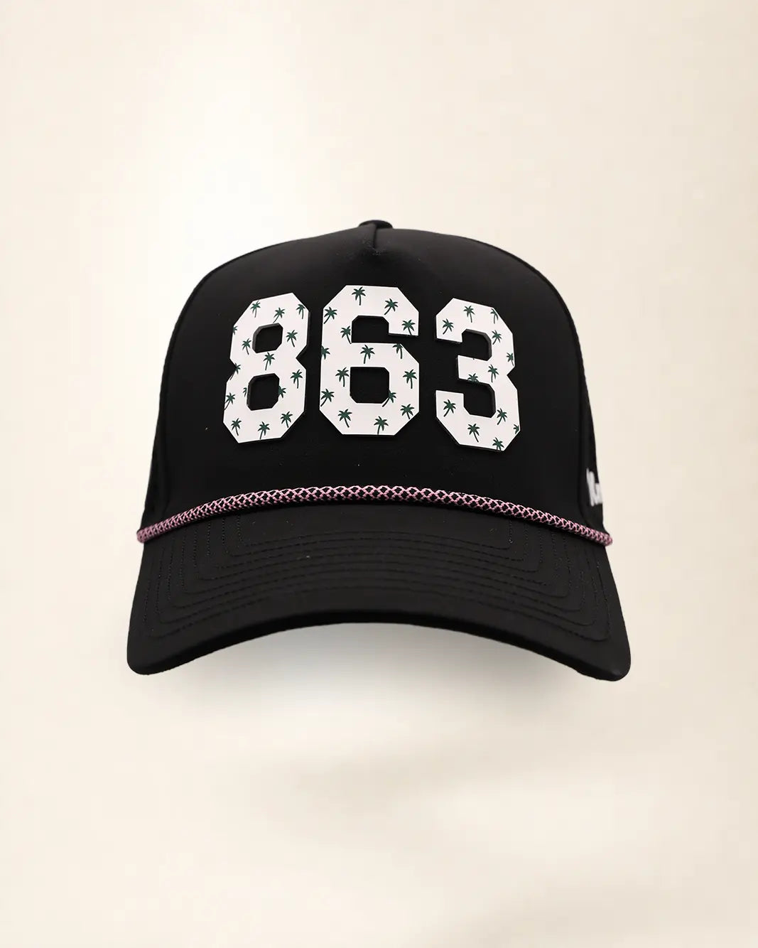 The 863 Signature Hat (Black), front view: white raised 863 with small palm print on a black crown, pink and white rope along the brim.