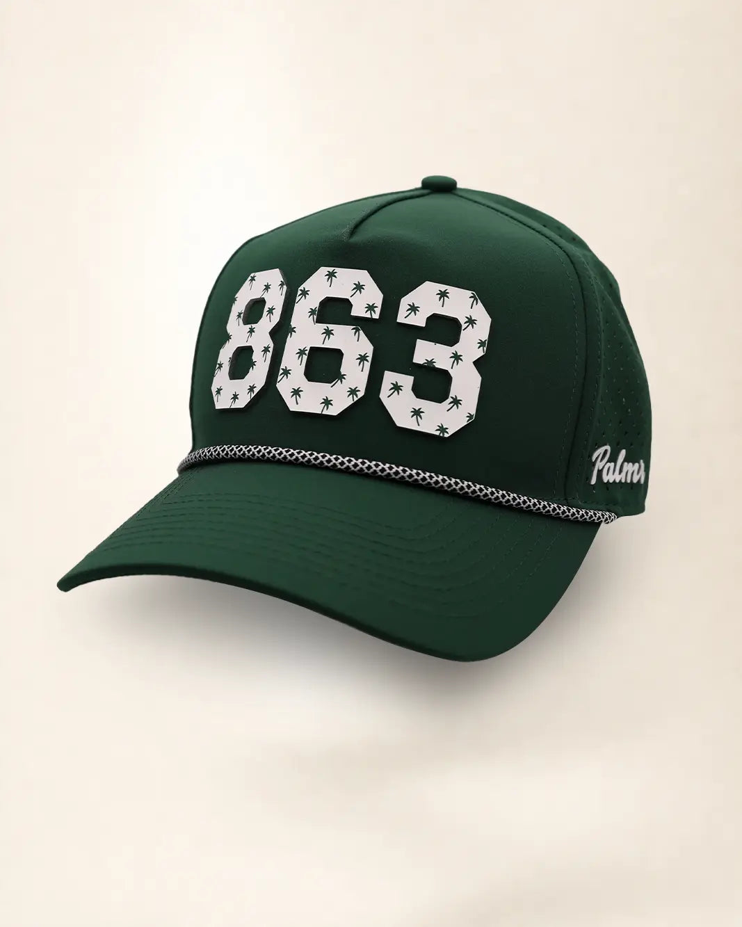 The 863 Signature Hat (Green): dark green rope snapback, white 863 with small green palm trees, black and white braided rope, perforated sides.