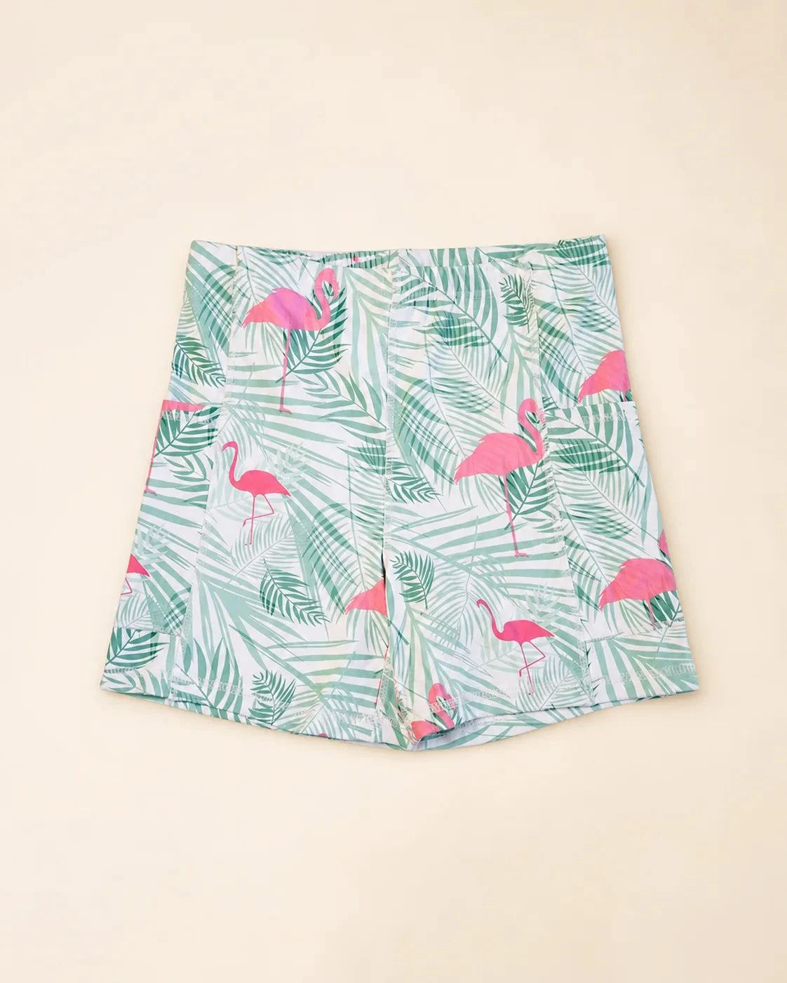 White Ace Dress with palm leaves and flamingos in Island Breeze print, casual sporty style with pockets and removable bra cups