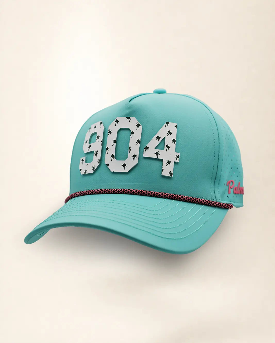 The 904 Signature Hat (Teal): teal Palmr rope snapback, white raised 904 with small palm print, pink and black rope on the brim, pink Palmr script.