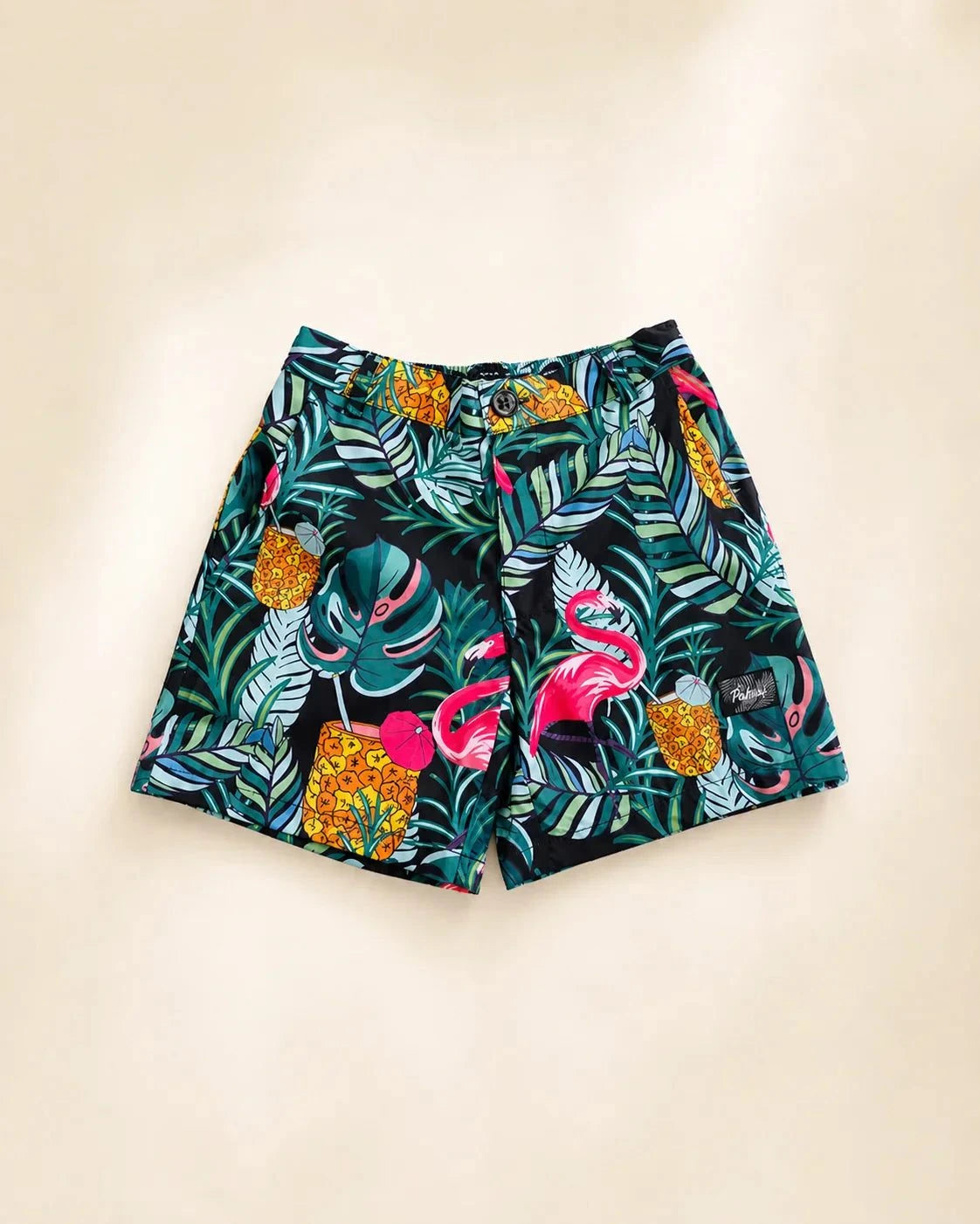 Baha Palm Kids tropical hybrid swim shorts with quick-dry fabric and zippered pockets on black background