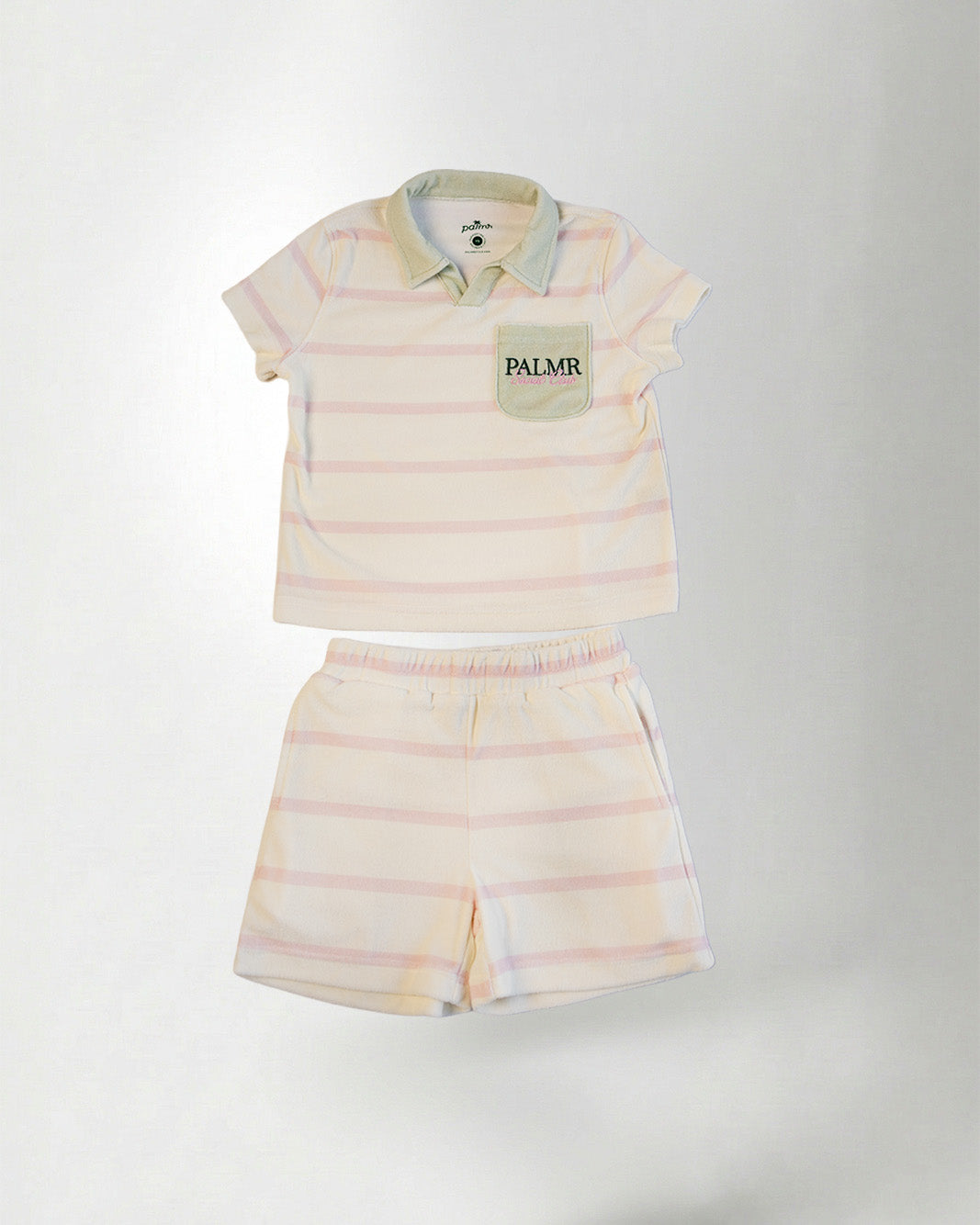 Striped children's polo shirt and shorts set with 'PALMR' branding on a white background