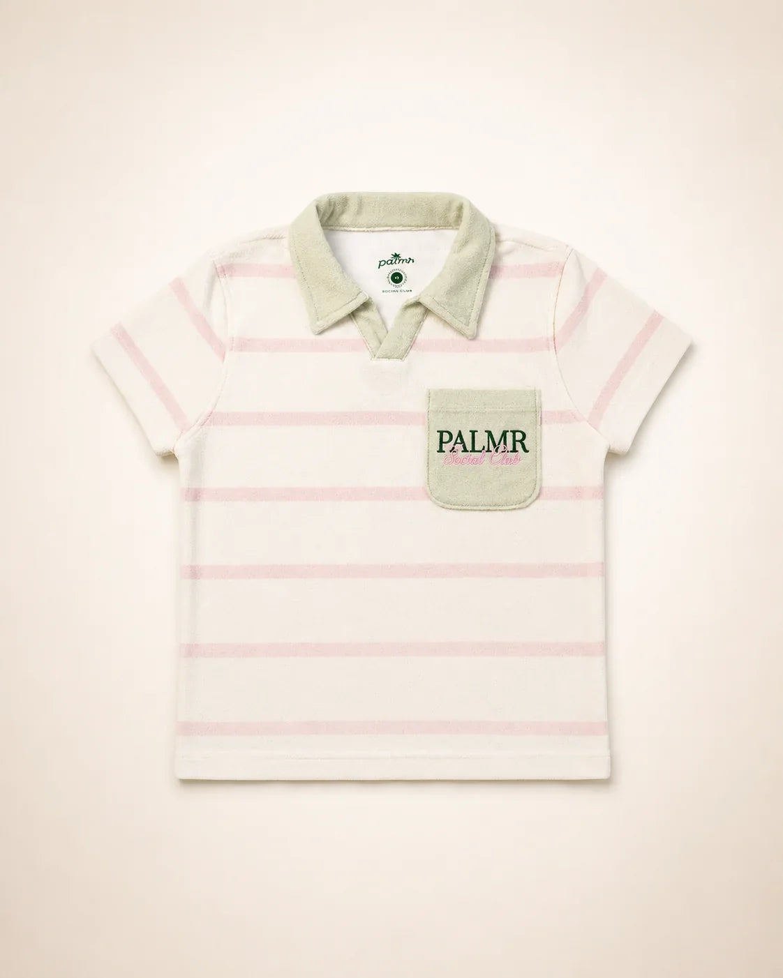 Girl wearing Cabana Pink Stripe top with green collar and pocket