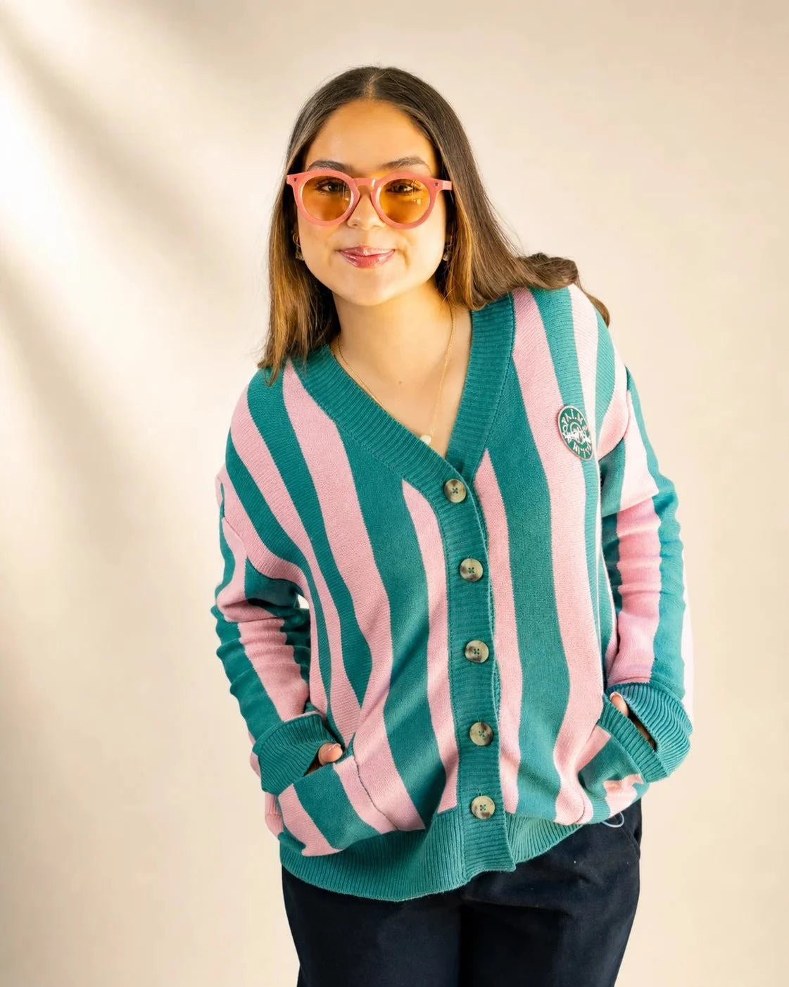 The Palm of My Heart Cardigan pink and cream striped cozy knit sweater with embroidered Palmr Social Club patch and front pockets