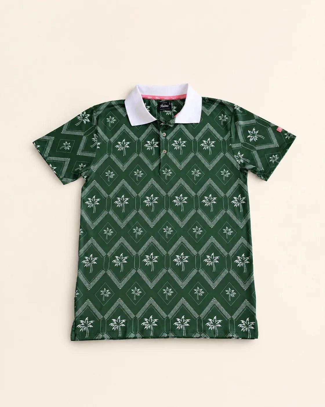 The Club Palm Polo in palm green with geometric diamond pattern and palm tree details, featuring a white ribbed collar.