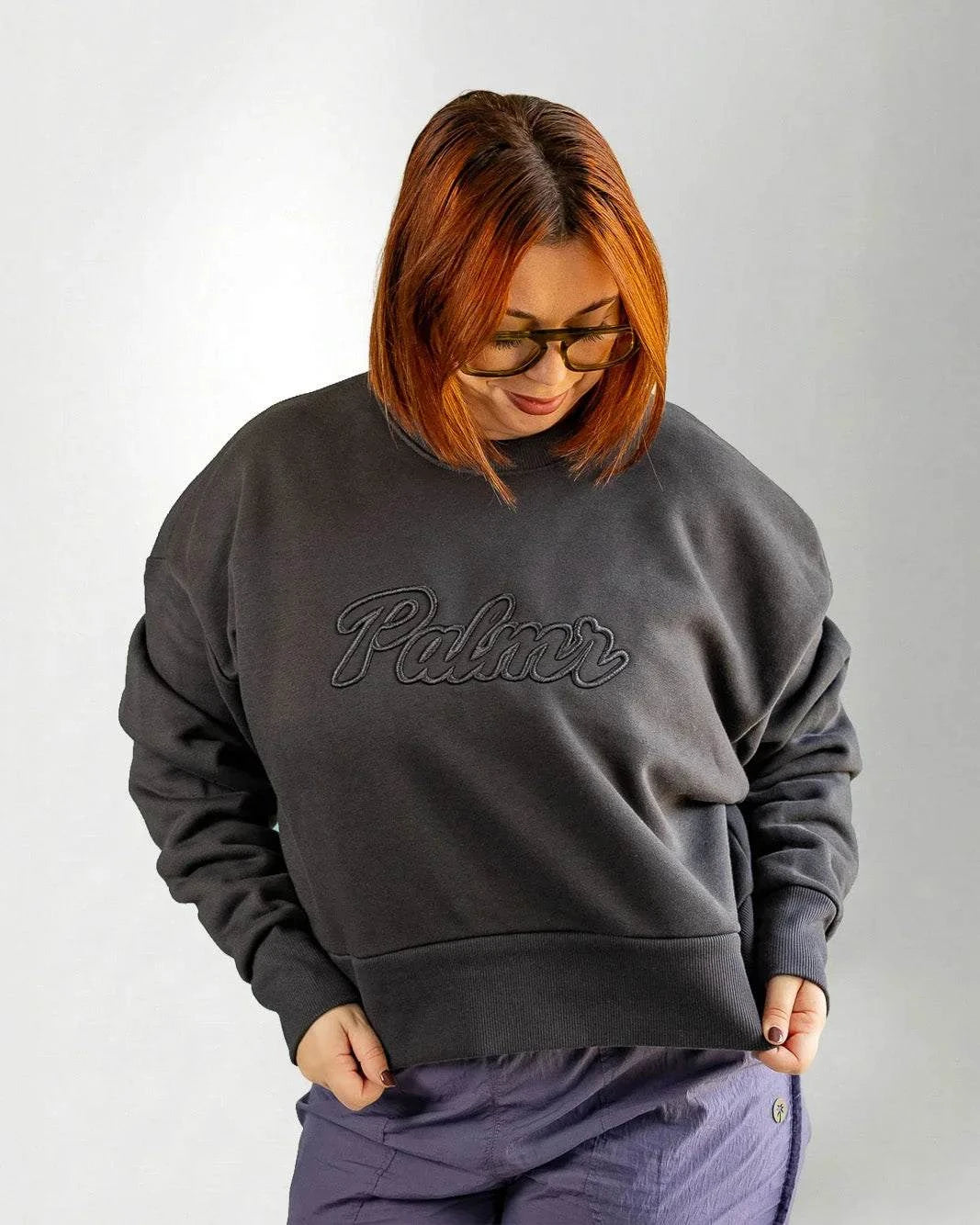 The Palmr Crew Sweatshirt in dark grey with 3D embroidered logo and relaxed cropped fit