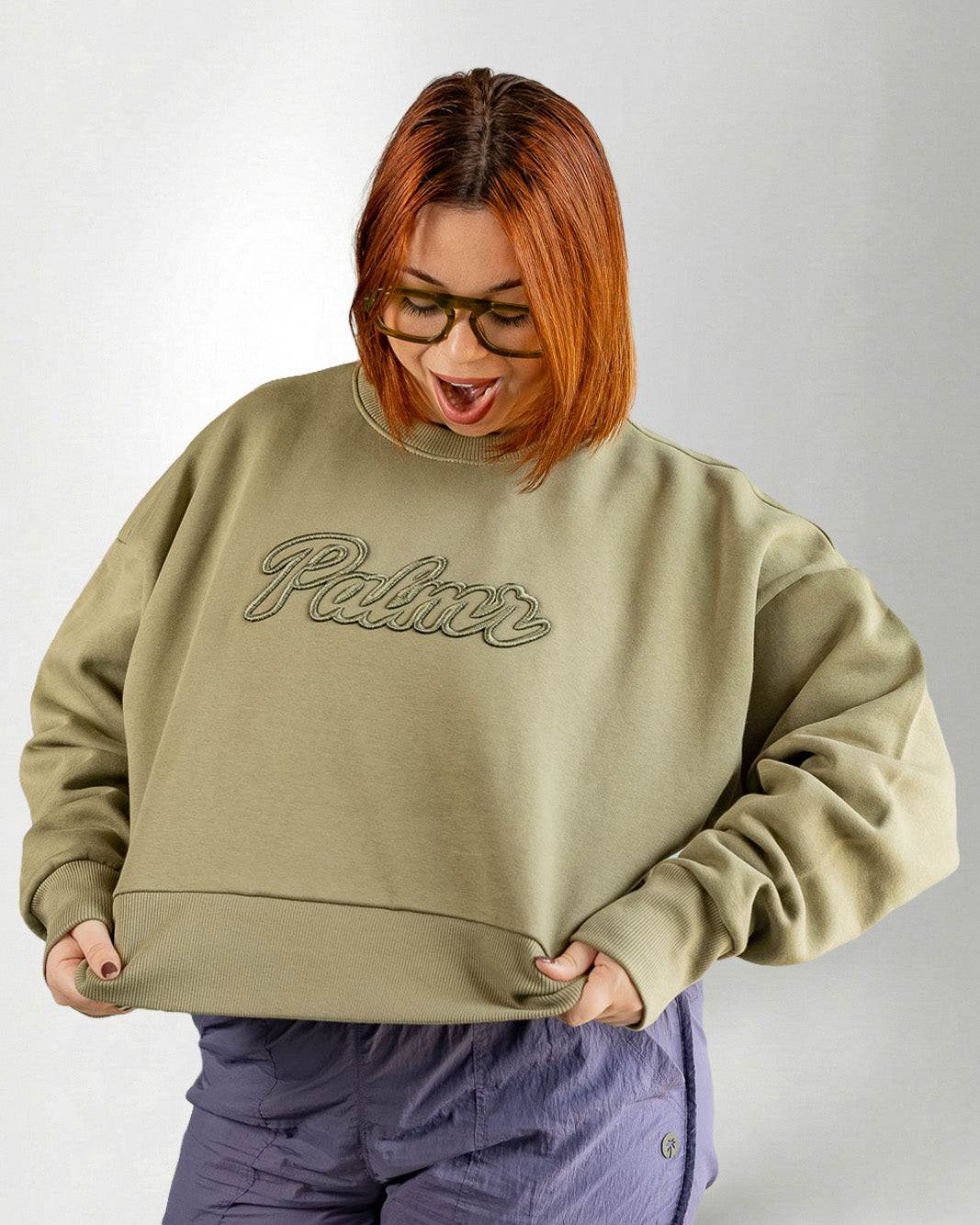The Palmr Crew Sweatshirt in olive with oversized crop fit and 3D embroidered logo