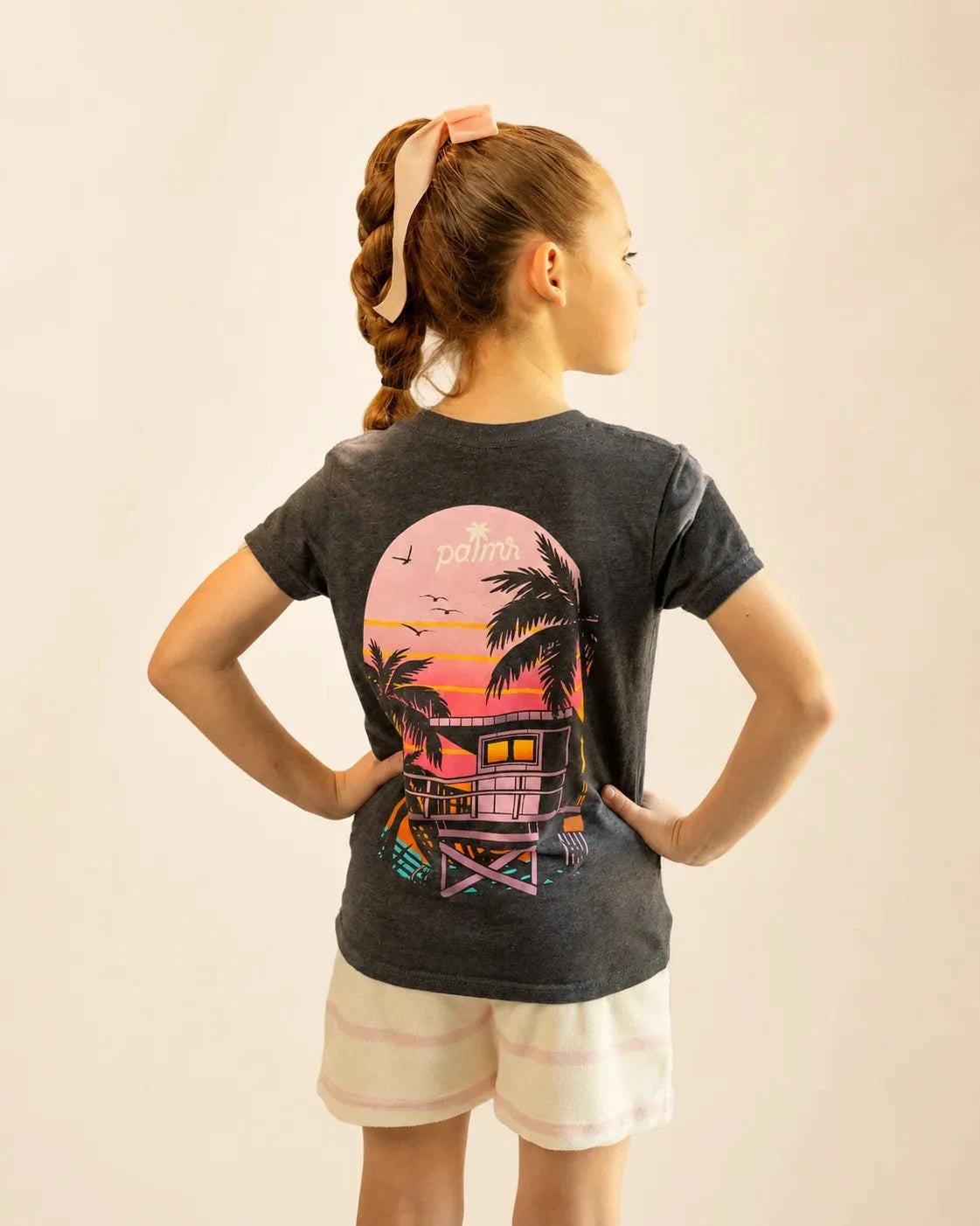 Black mineral wash Evening Palm Kids Tee with Palmr logo and beach-sunset graphic, soft cotton-poly blend for kids