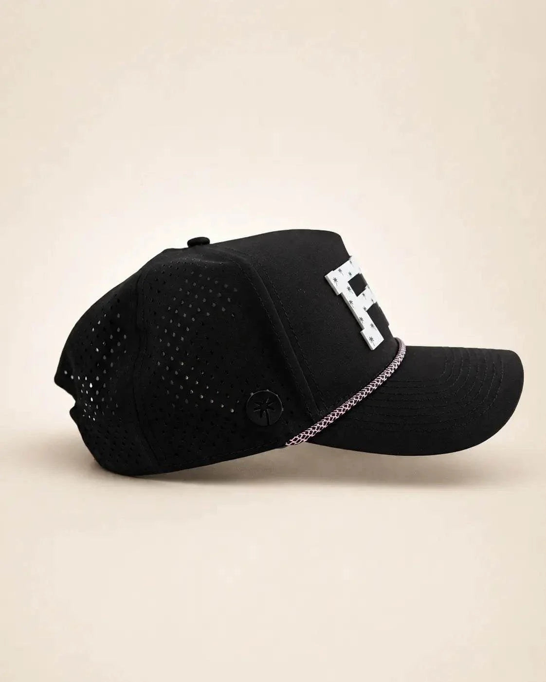 Black FL Signature Hat with white silicone letters and palm design, water-resistant and structured, known as The 407 Hat