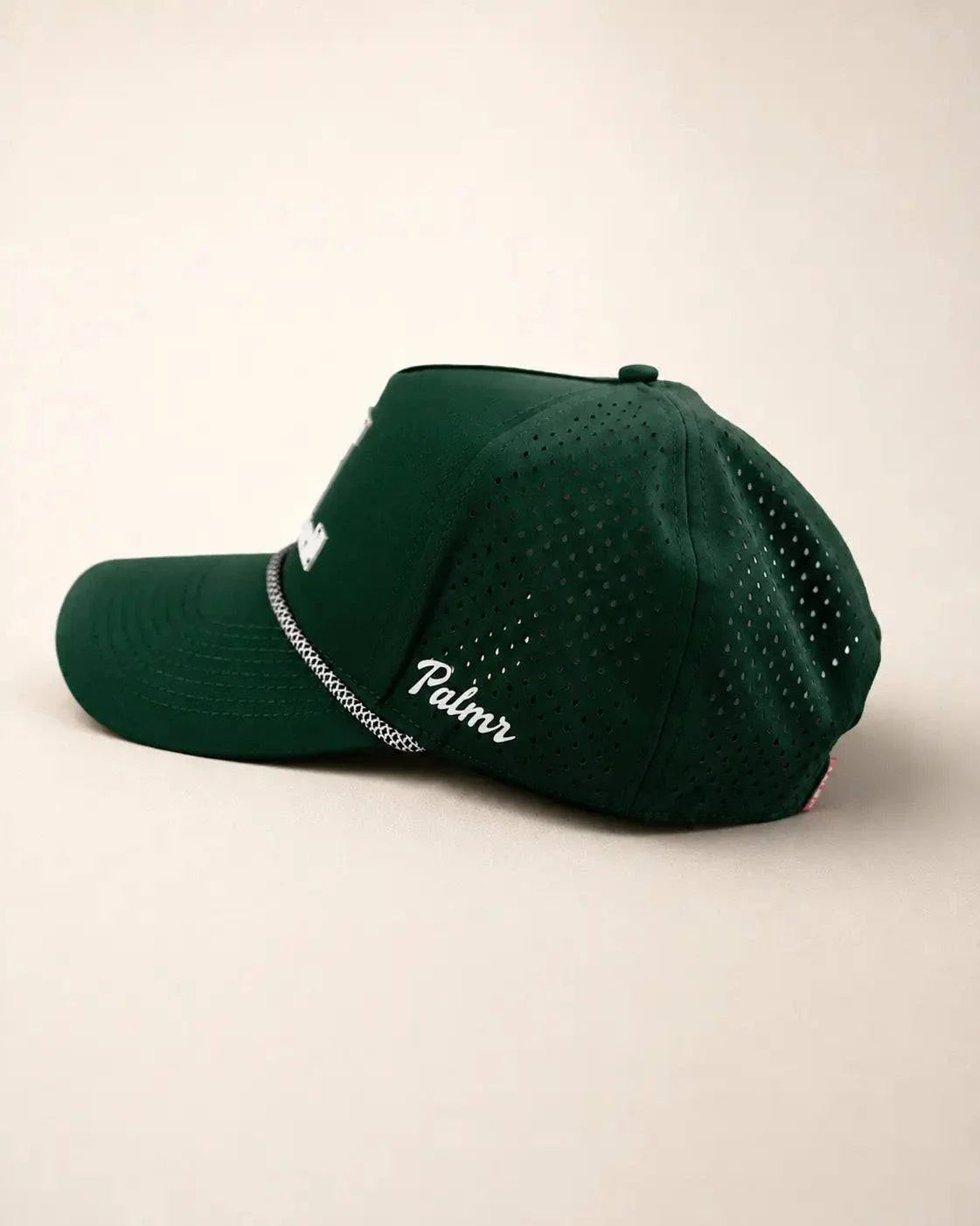 Green FL Signature Hat with white raised silicone letters and palm design, structured rope front, water-resistant and heat-ready, representing all of Florida.