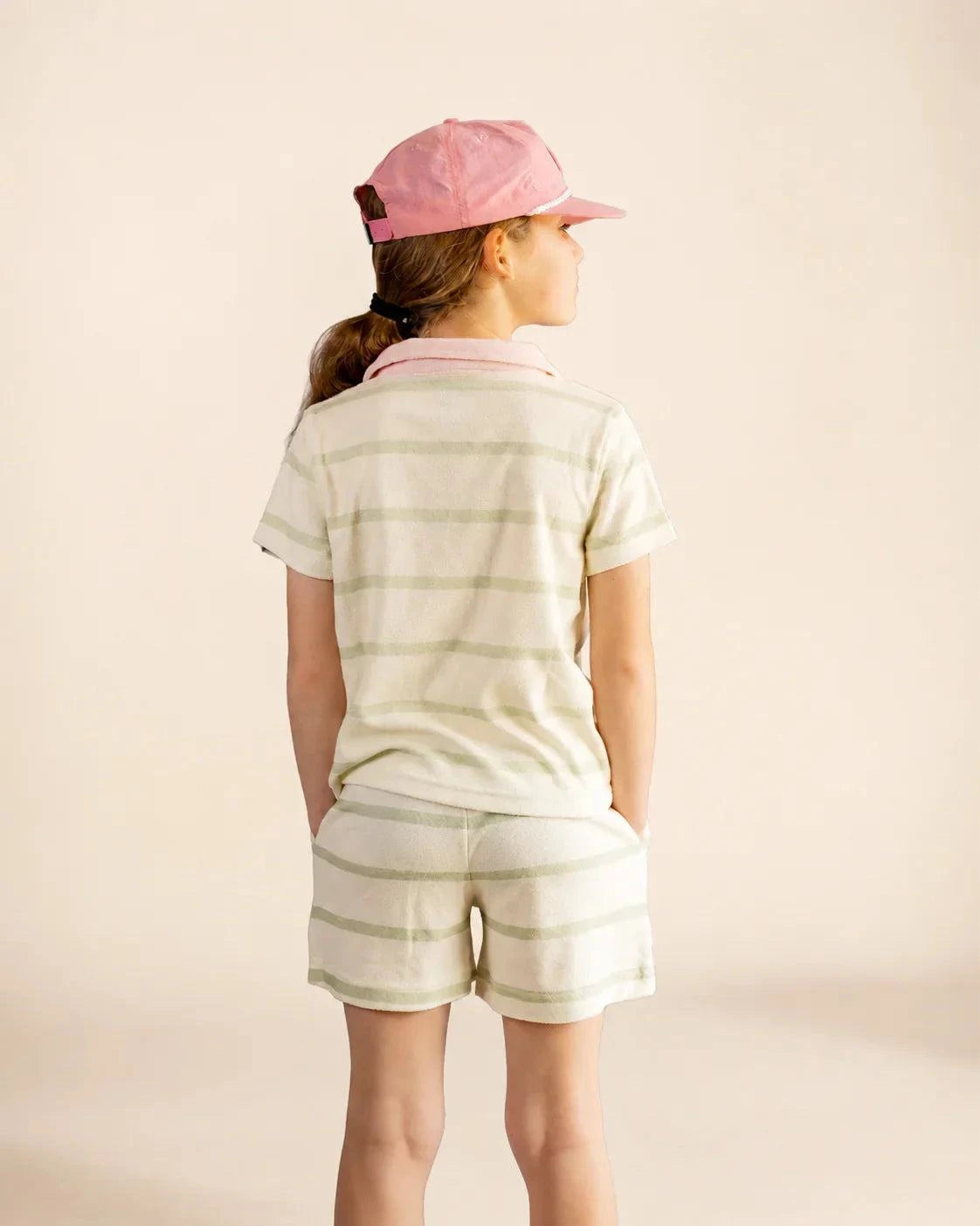 The Cabana Green Stripe Girl's Top in soft micro-terry cloth with green collar and pocket