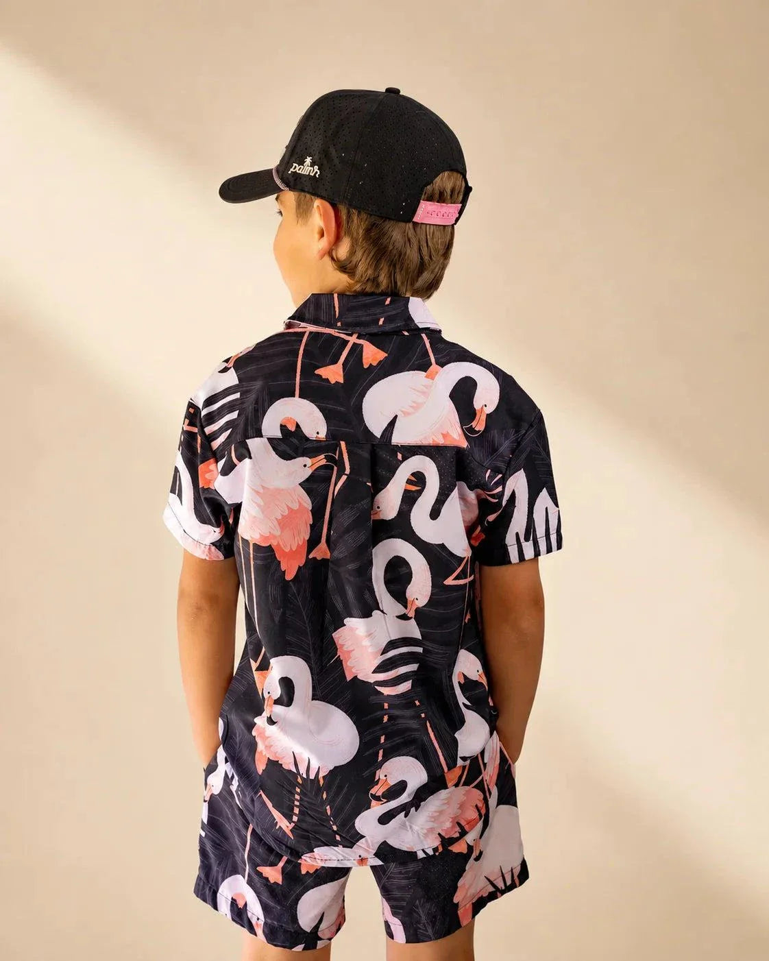 Night Flamingo Kids Button Up shirt with oversized flamingo print on black fabric for cool, casual wear