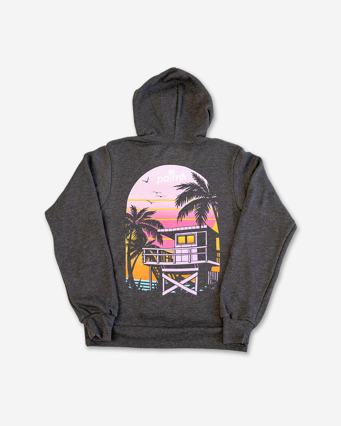 Gray hoodie with a sunset and palm tree design on the back, on a white background