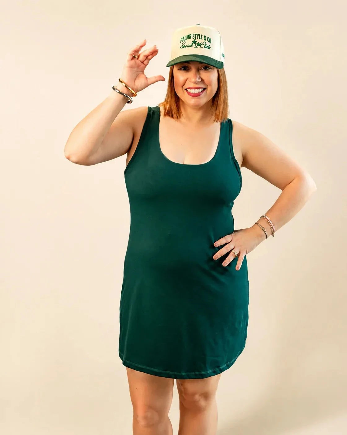 The Ace Dress in solid palm green with pockets and removable bra cups