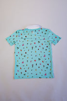 Light blue t-shirt with colorful pattern on a white background