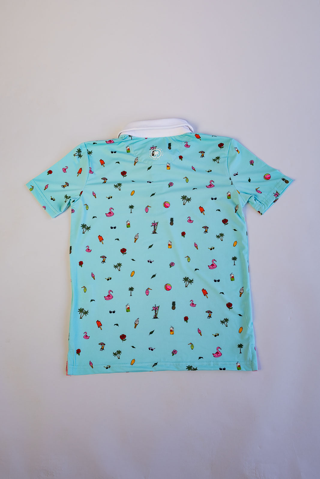 Light blue t-shirt with colorful pattern on a white background