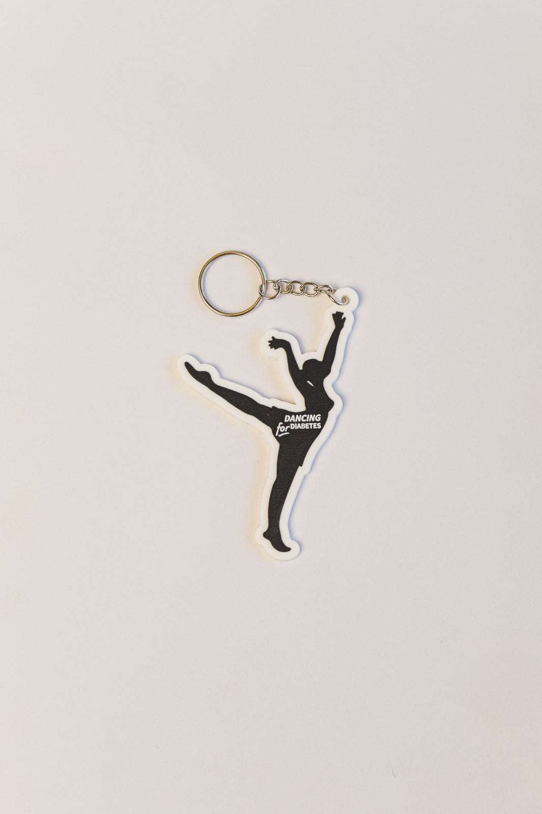 Dancing for Diabetes keychain with colorful design
