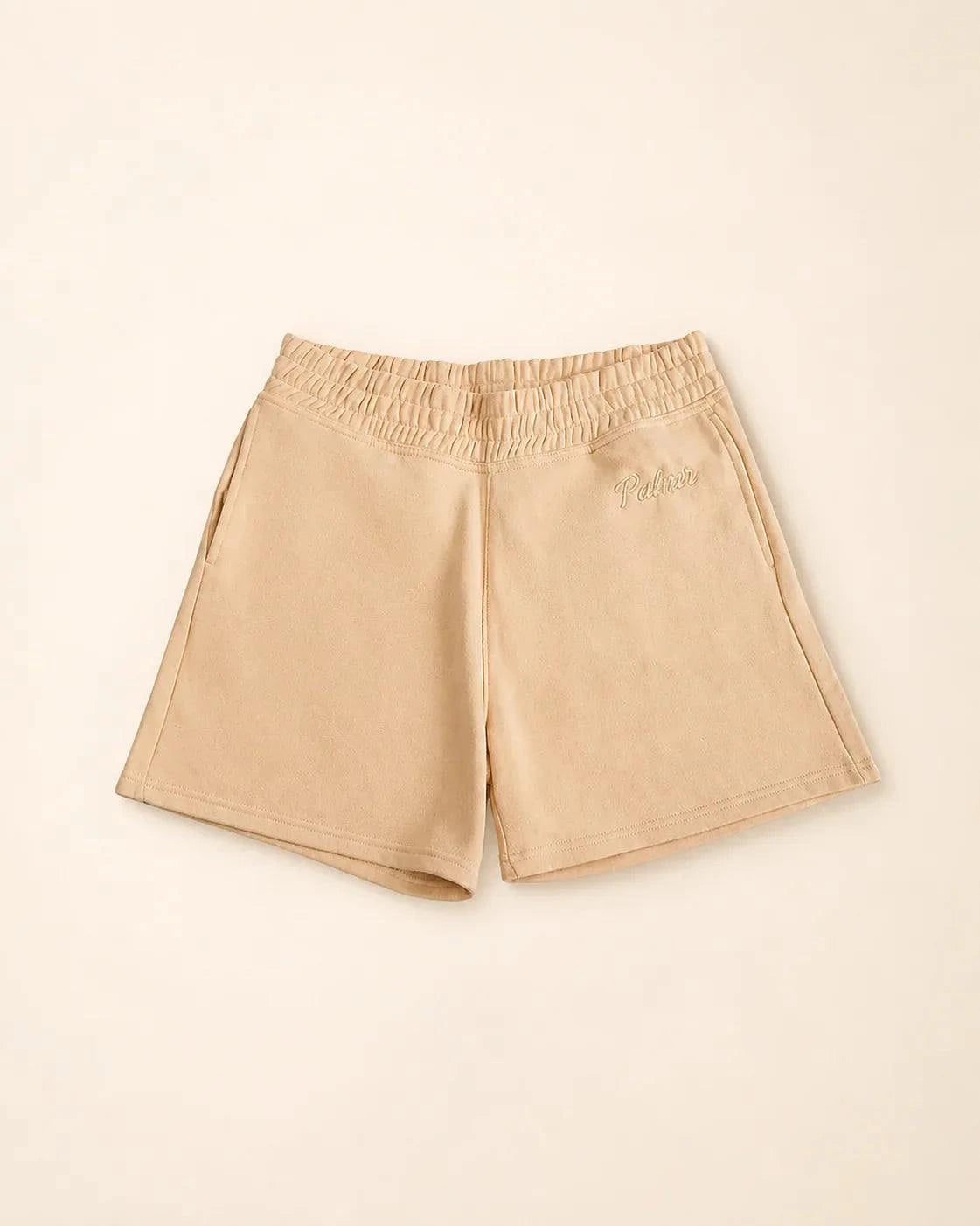 Cream Sandbar Fleece Shorts with elastic waistband and side pockets for casual wear