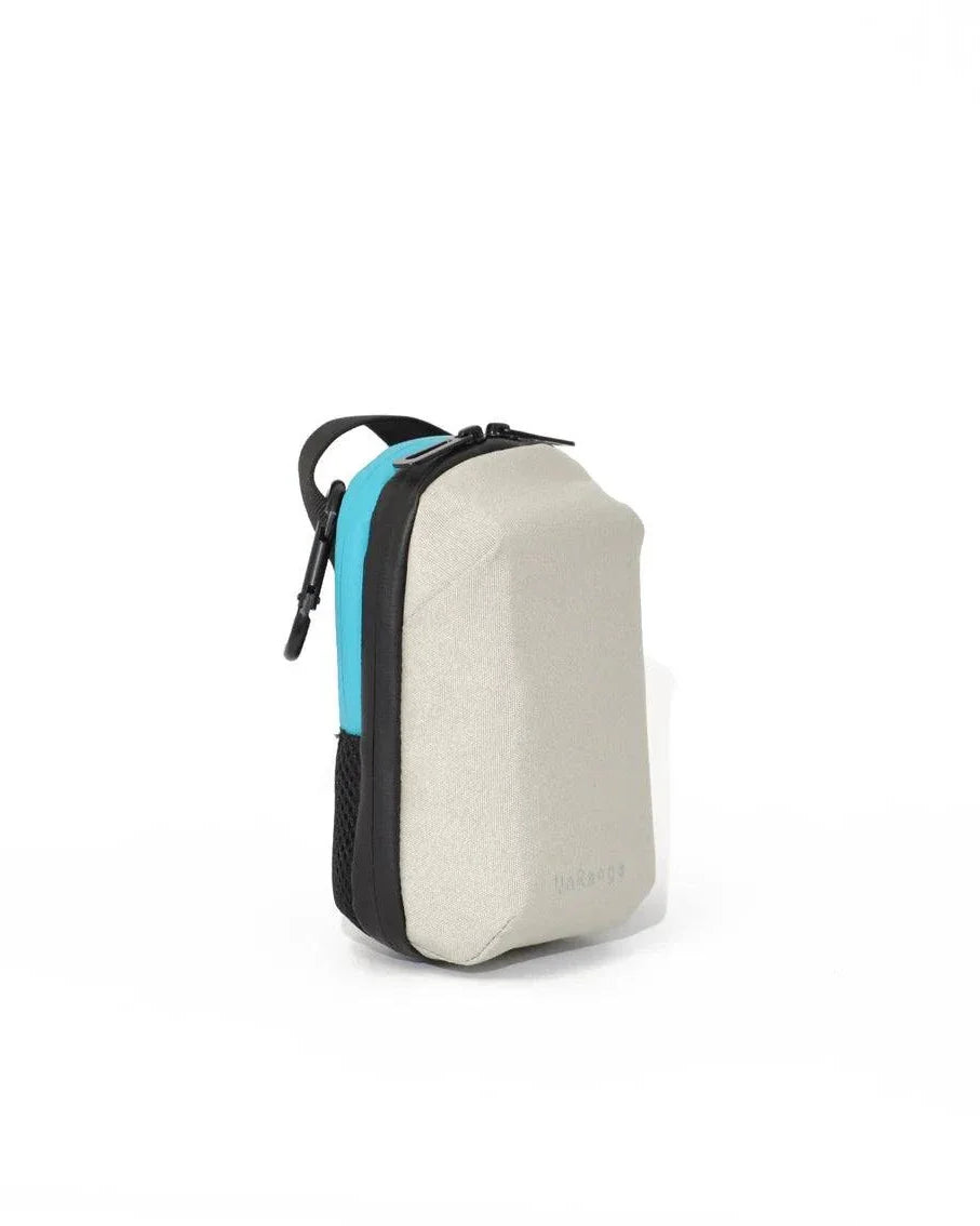 Compact insulated crossbody bag with nylon strap, carabiner clips, and freezer pack for diabetes medication storage