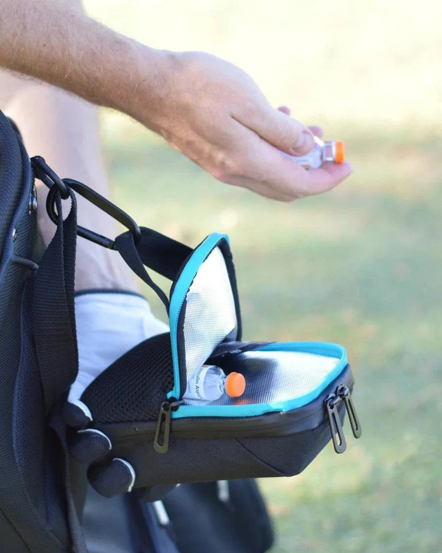 Compact insulated crossbody bag for diabetes supplies with clip attachments and chill pack