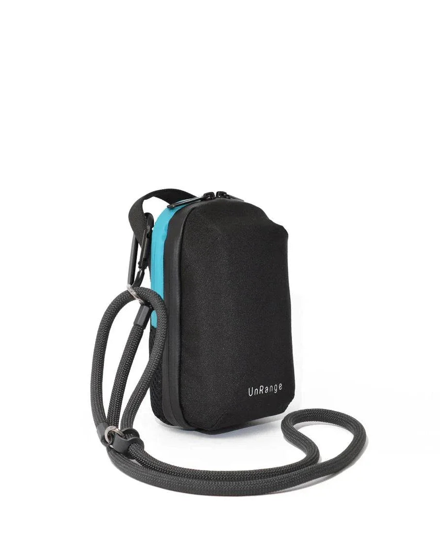 Compact insulated crossbody bag with nylon strap, carabiners, and freezer pack for diabetes medication storage