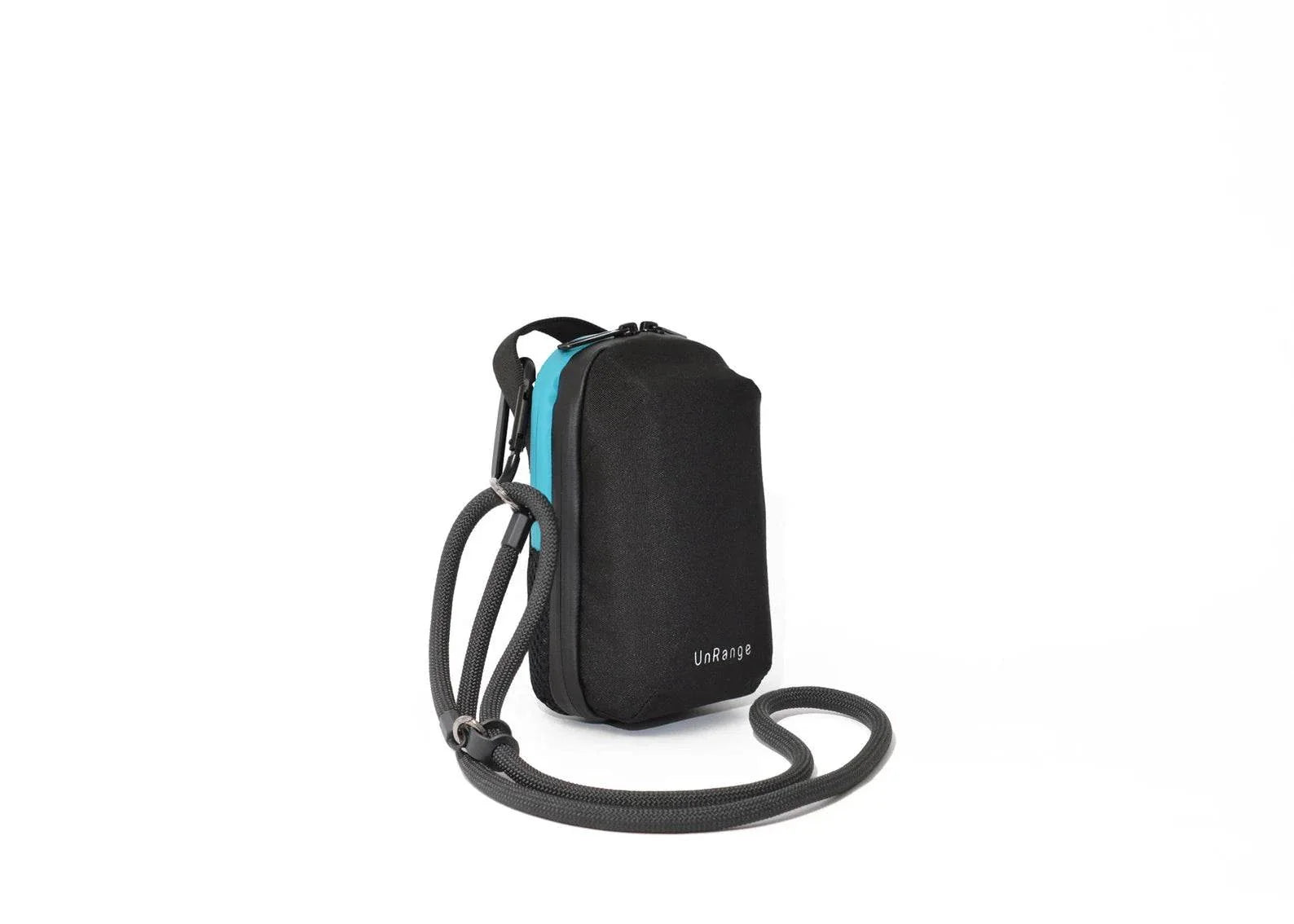 Compact insulated crossbody bag with nylon strap, carabiners, and freezer pack for diabetes medication storage