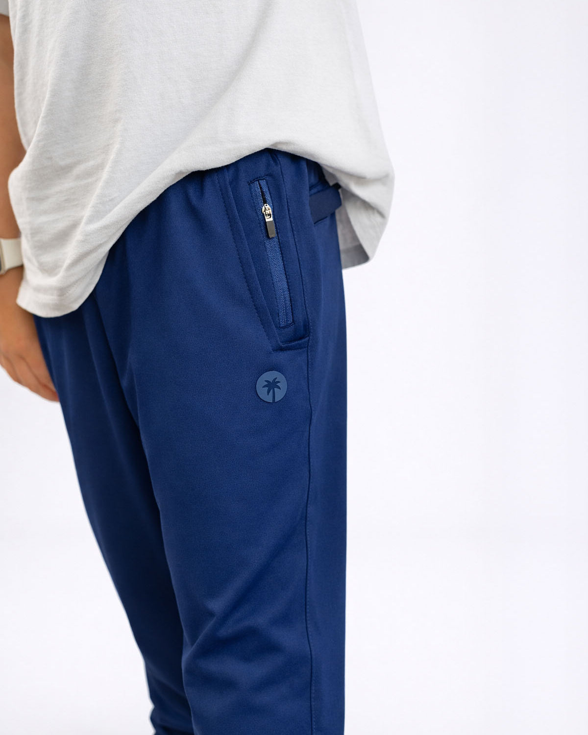 Blue pants with a logo on a white background