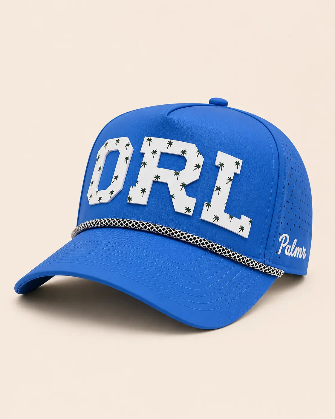 Blue cap with 'ORL' and palm tree design on a beige background