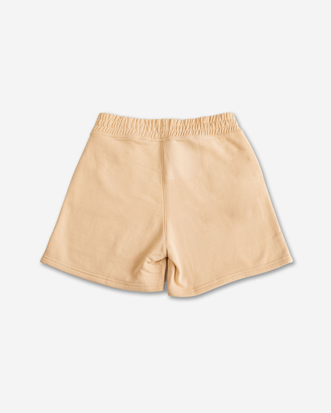 Beige shorts on a light gray background