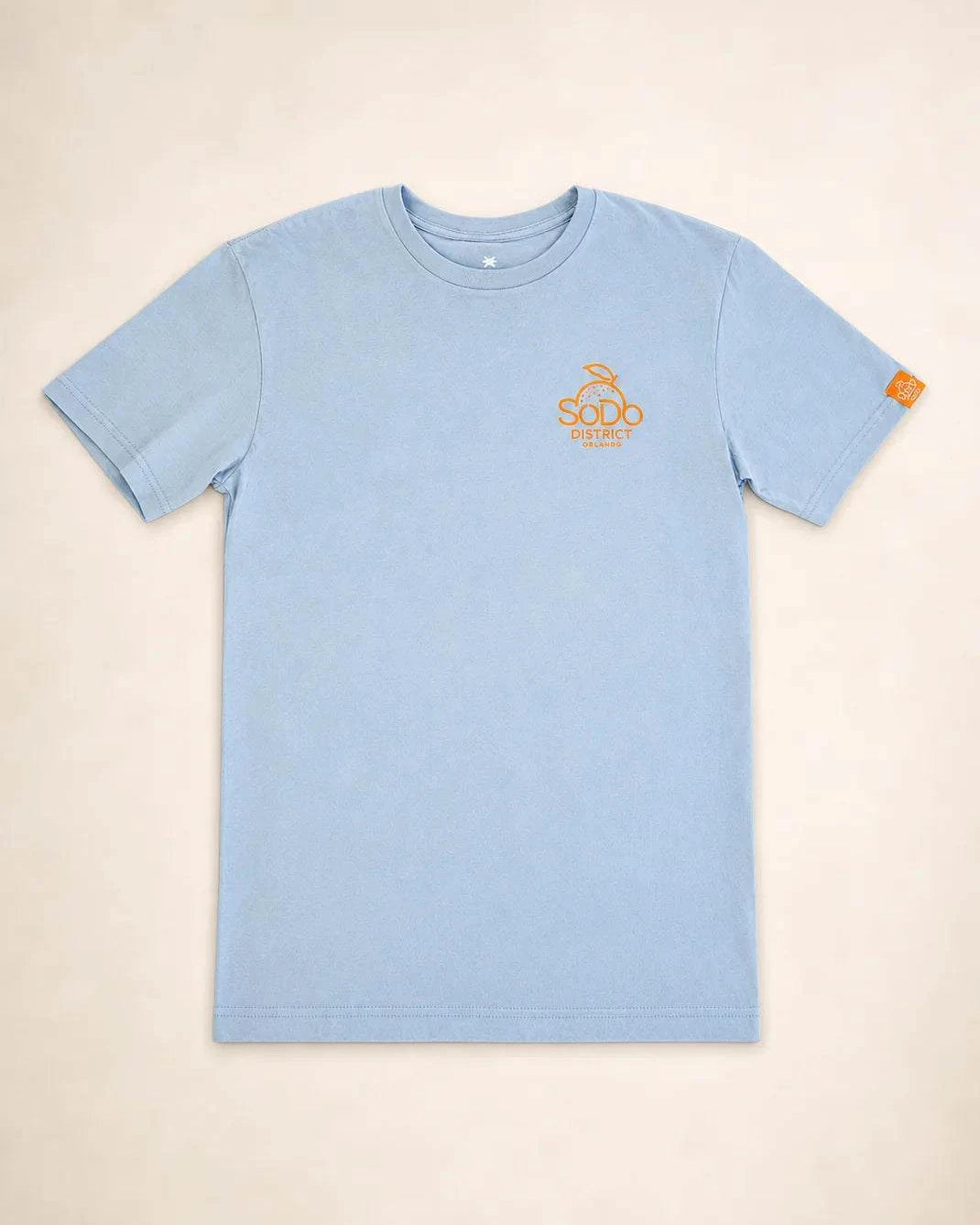 Blue SoDo Neighborhood Tee with orange logo and neighborhood icons on back representing community pride