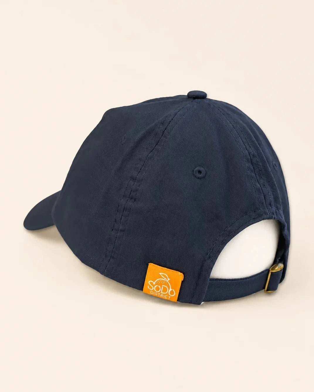 Navy SoDo Classic Dad Cap with embroidered logo and antique brass buckle