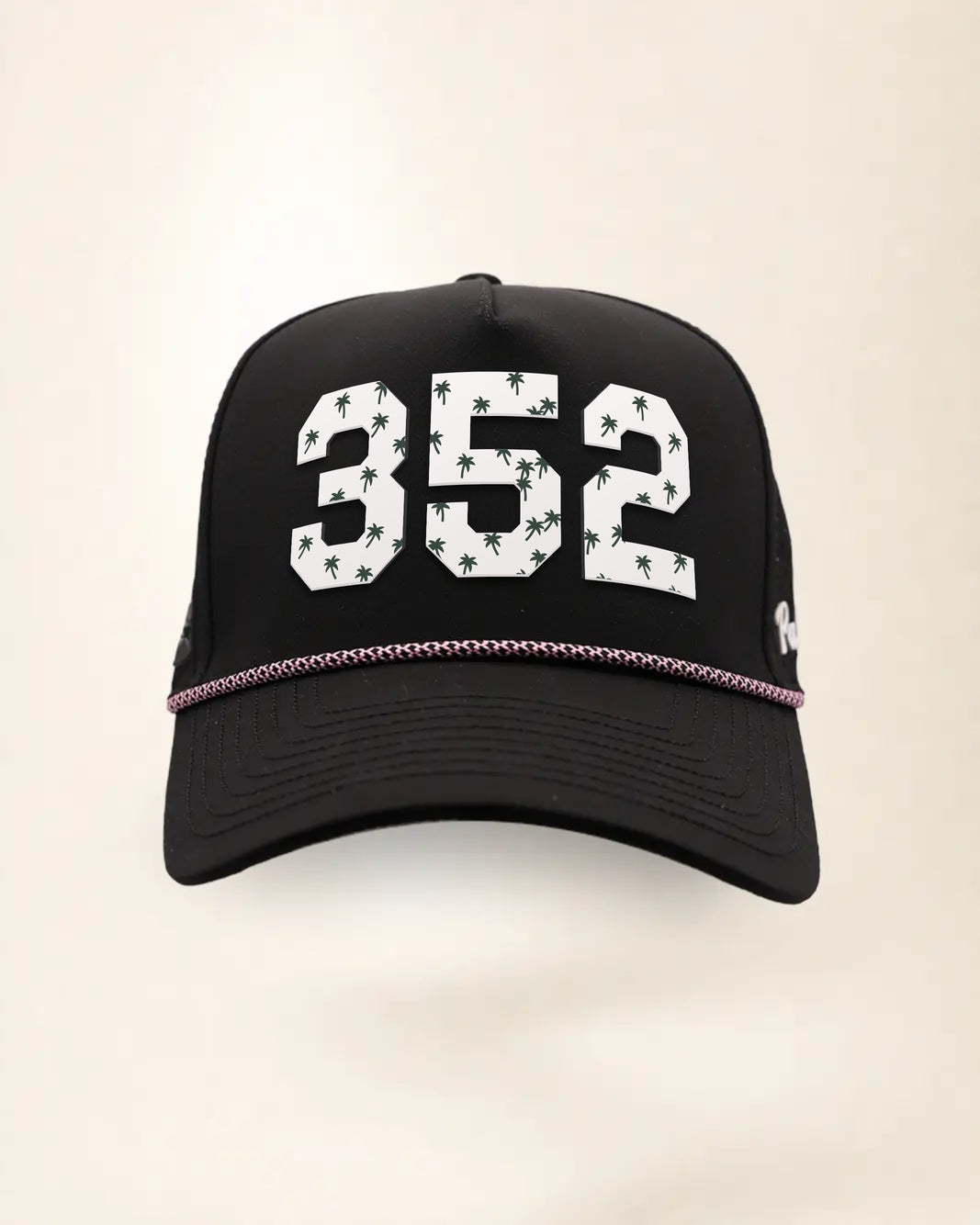 The 352 Signature Hat (Black), front view: white raised 352 with small palm print on a black crown, pink and white rope along the brim.