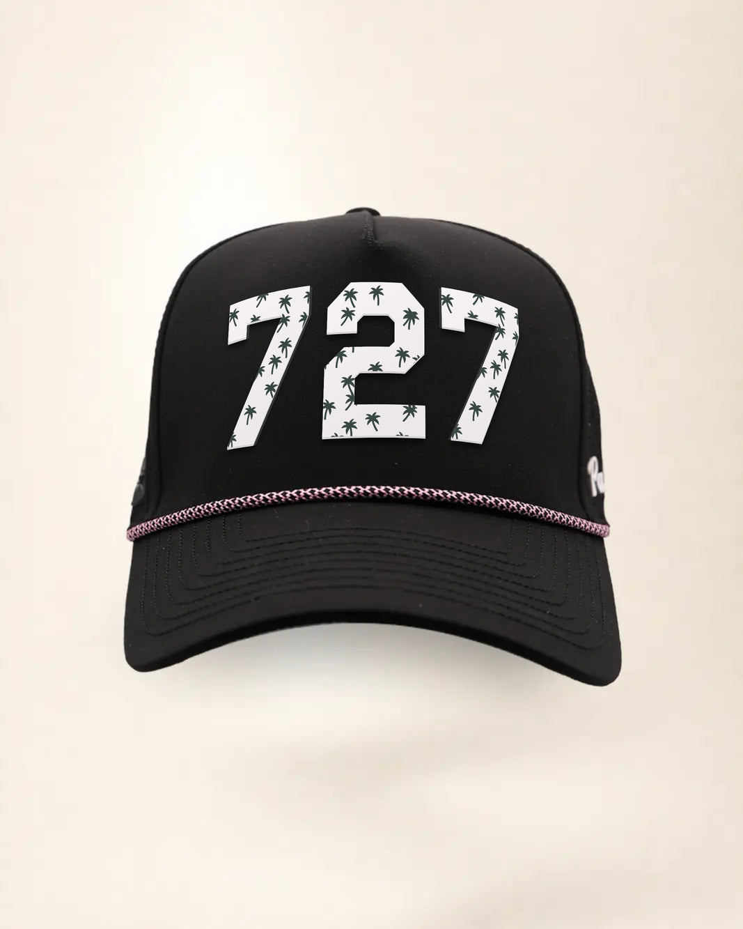 The 727 Signature Hat (Black), front view: white raised 727 with small palm print on a black crown, pink and white rope along the brim.