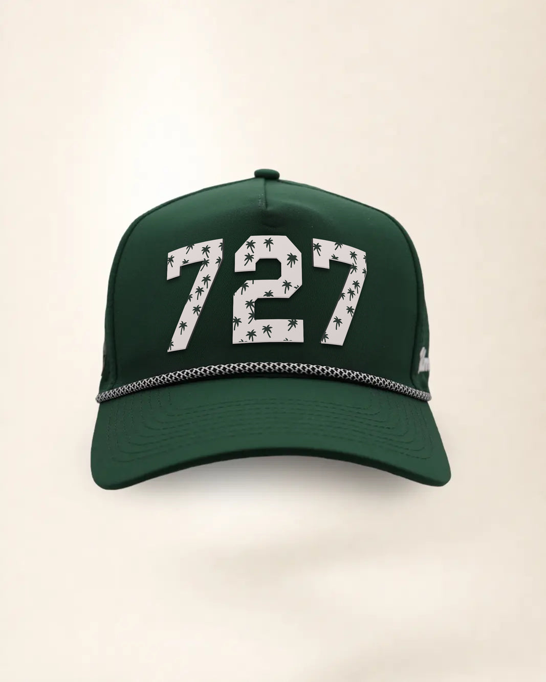 The 727 Signature Hat (Green), front view: white raised 727 with small palm print on a green crown, black and white rope along the brim.