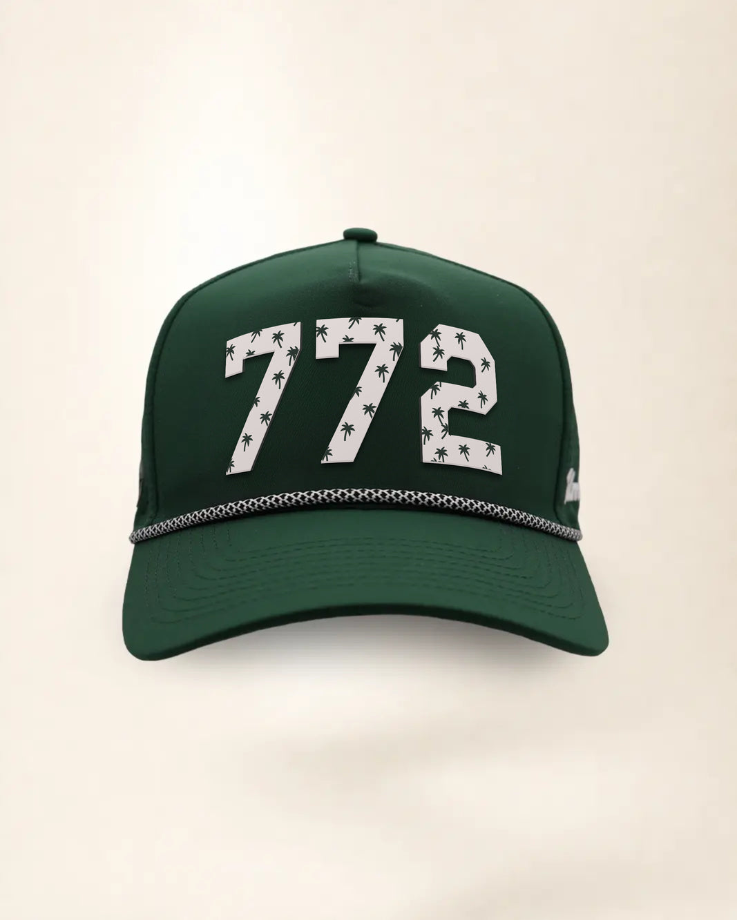 The 772 Signature Hat (Green), front view: white raised 772 with small palm print on a green crown, black and white rope along the brim.