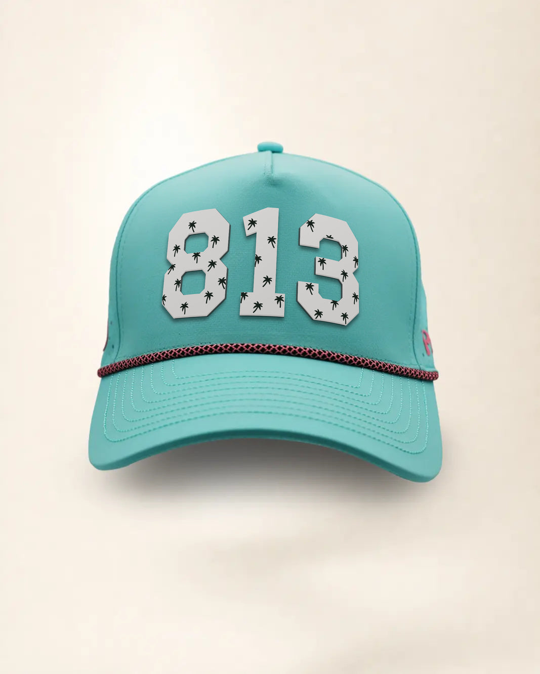 The 813 Signature Hat (Teal), front view: white raised 813 with small palm print on a teal crown, pink and black rope along the brim.