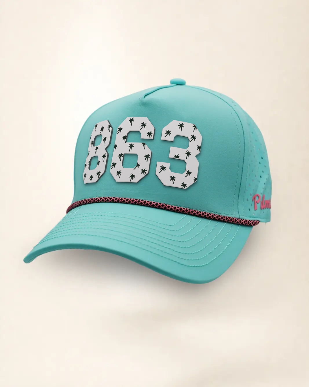 The 863 Signature Hat (Teal), three-quarter view: white raised 863 with small palm print on a teal rope snapback, pink and black rope, pink Palmr script.