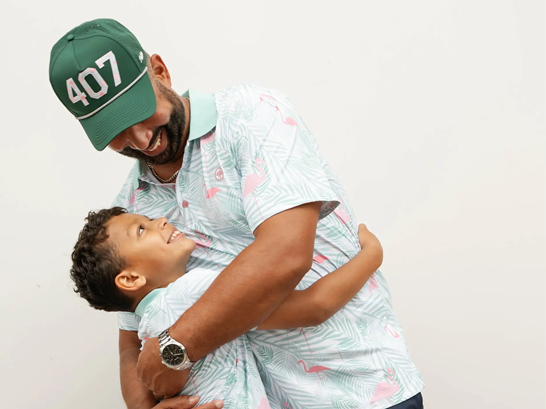 Father and son wearing a matching Palmr outfit