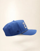 The 239 Signature Hat (Blue), right side view: perforated side panel, palm badge, black and white rope, edge of the white 239.