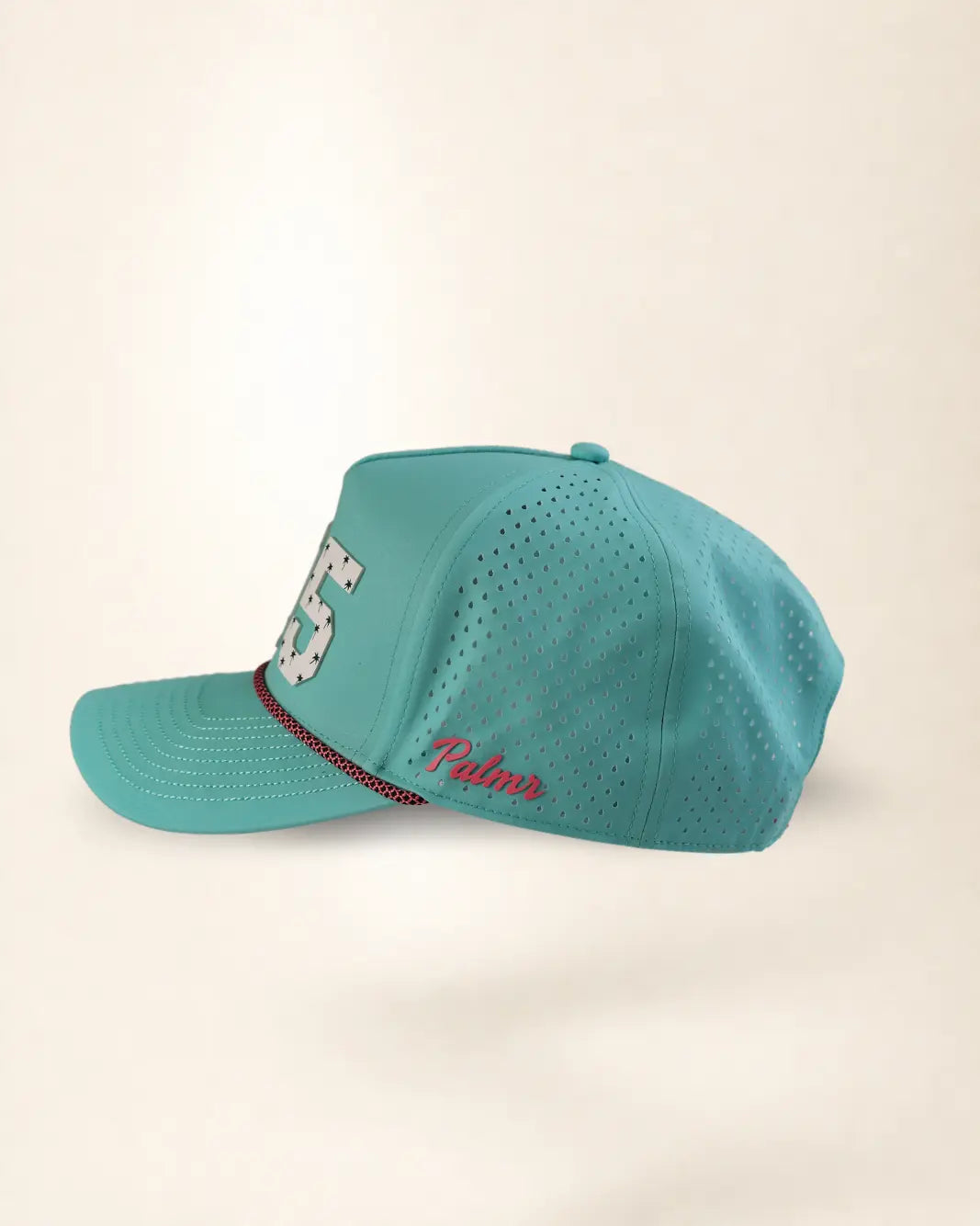 A teal mesh baseball cap with a curved brim, featuring a white embroidered '55' on the front and 'Palm' in red script on the side, set against a plain cream background.